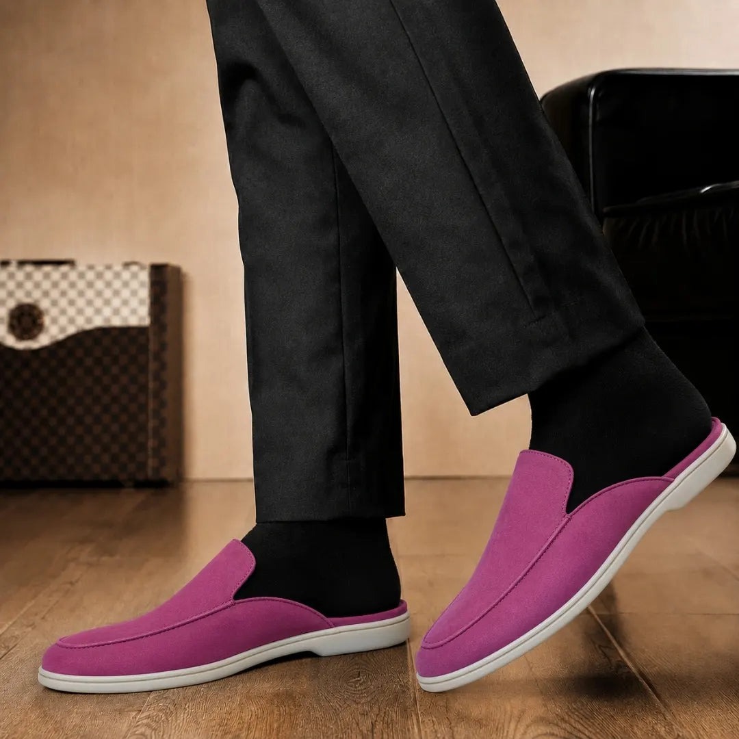 Melodiapelle Mole Mule in magenta pink suede worn with trousers, on-feet shot