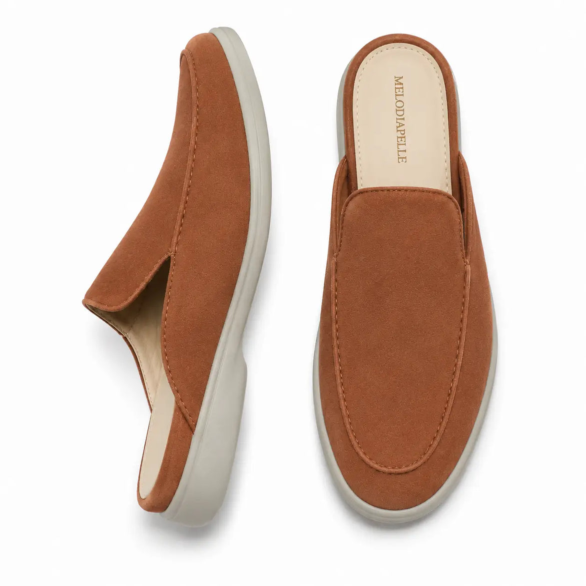 Tan rust suede backless mule slipper, three-quarter angle showing heel and sole detailing