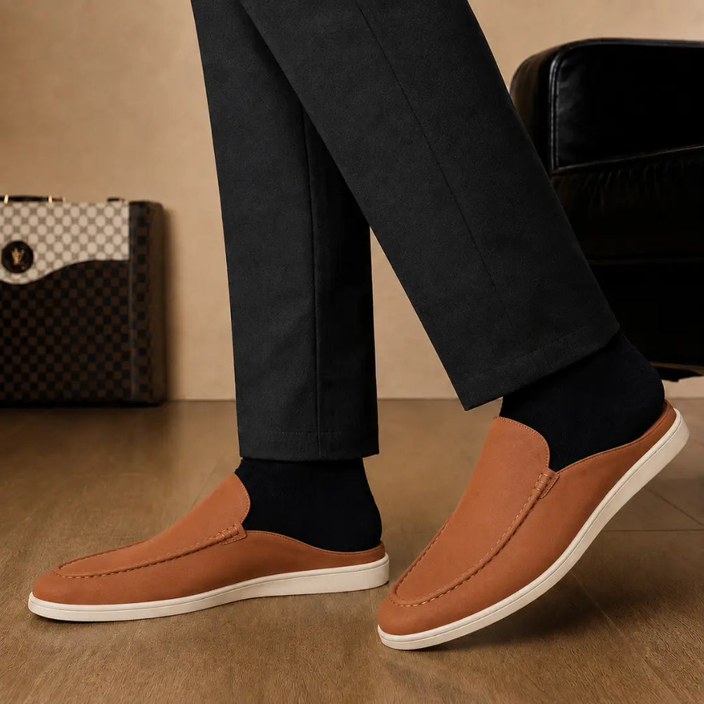 Melodiapelle Mole Mule in tan rust suede worn with trousers, on-feet shot