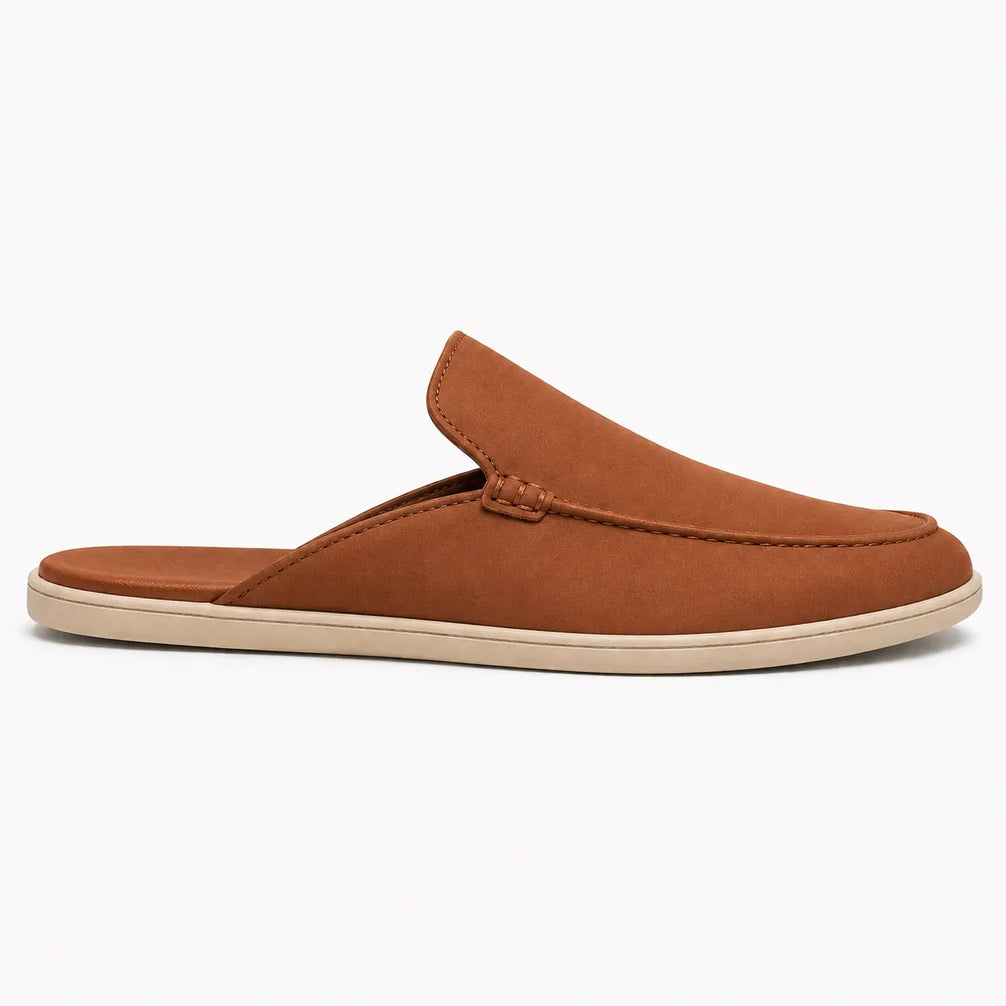 Side profile of the Mole Mule in tan rust suede on white background