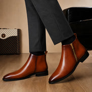 Melodiapelle Molino Zip Ankle Boot in burnished cognac leather worn with trousers, styled on-feet shot