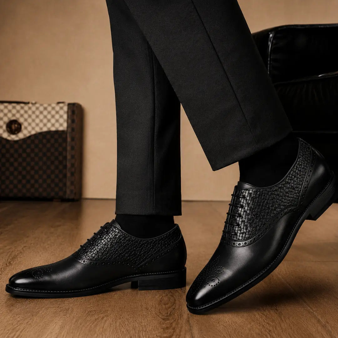 Melodiapelle Monaldo Woven Brogue Oxford in black leather worn with formal trousers, on-feet shot