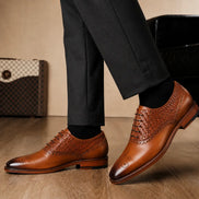 Melodiapelle Monaldo Woven Brogue Oxford in honey cognac leather worn with formal trousers, on-feet shot