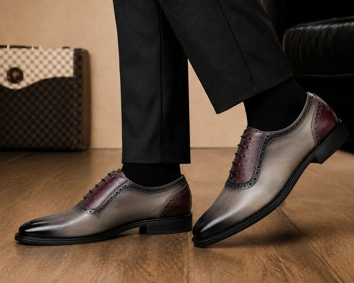 Melodiapelle Mondrian Two-Tone Saddle Oxford in storm grey and bordeaux leather worn with formal trousers, on-feet shot