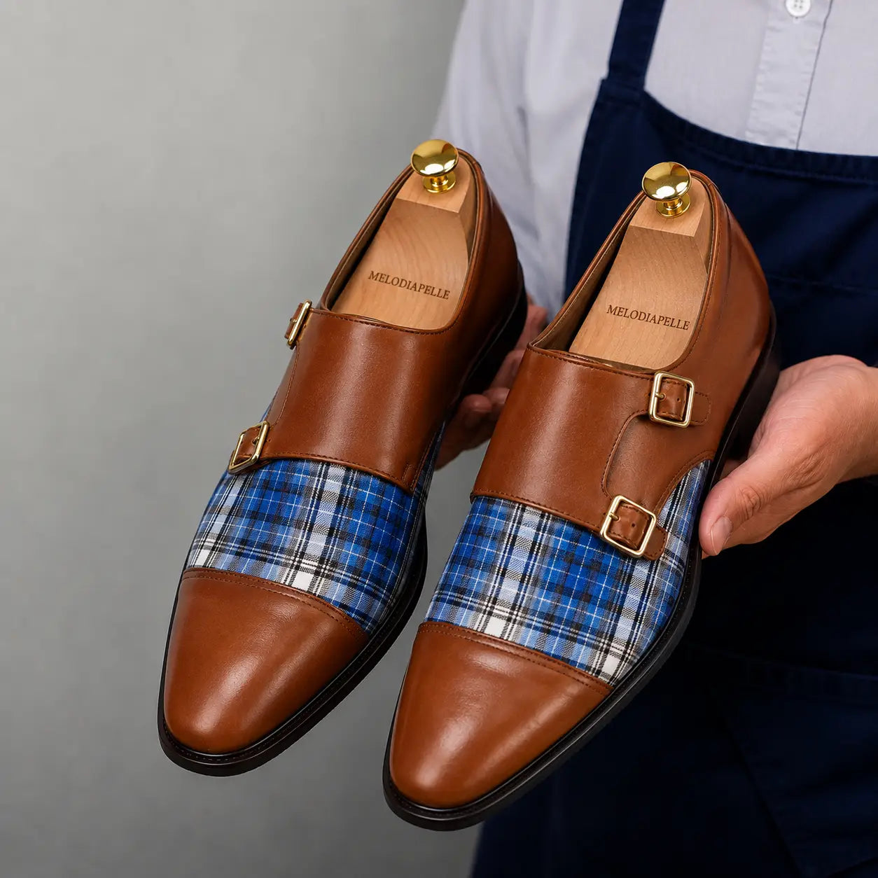 Man wearing Melodiapelle Monfort Tartan Monk Strap in tan and blue tartan with formal trousers, on-feet shot