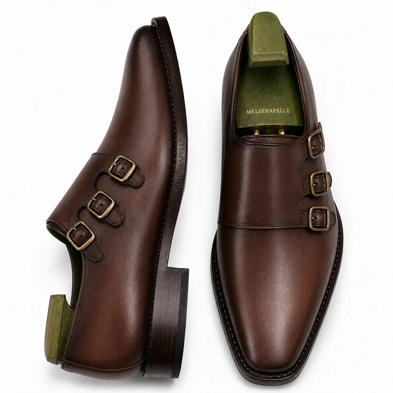 Dark chocolate leather double monk strap shoe, three-quarter angle showing buckles and heel