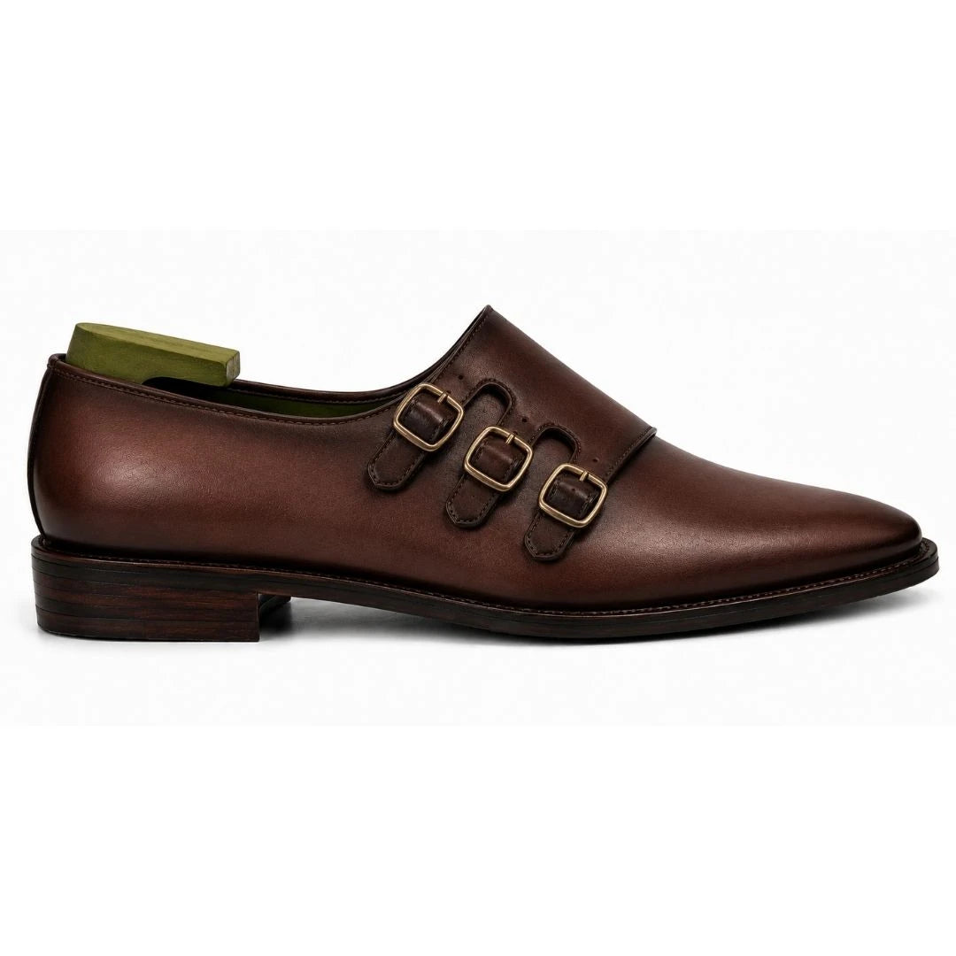 Side profile of the Montecito Double Monk Strap in dark chocolate leather on white background