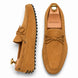 Camel tan suede driving loafer with bow lace, three-quarter angle showing sole detailing