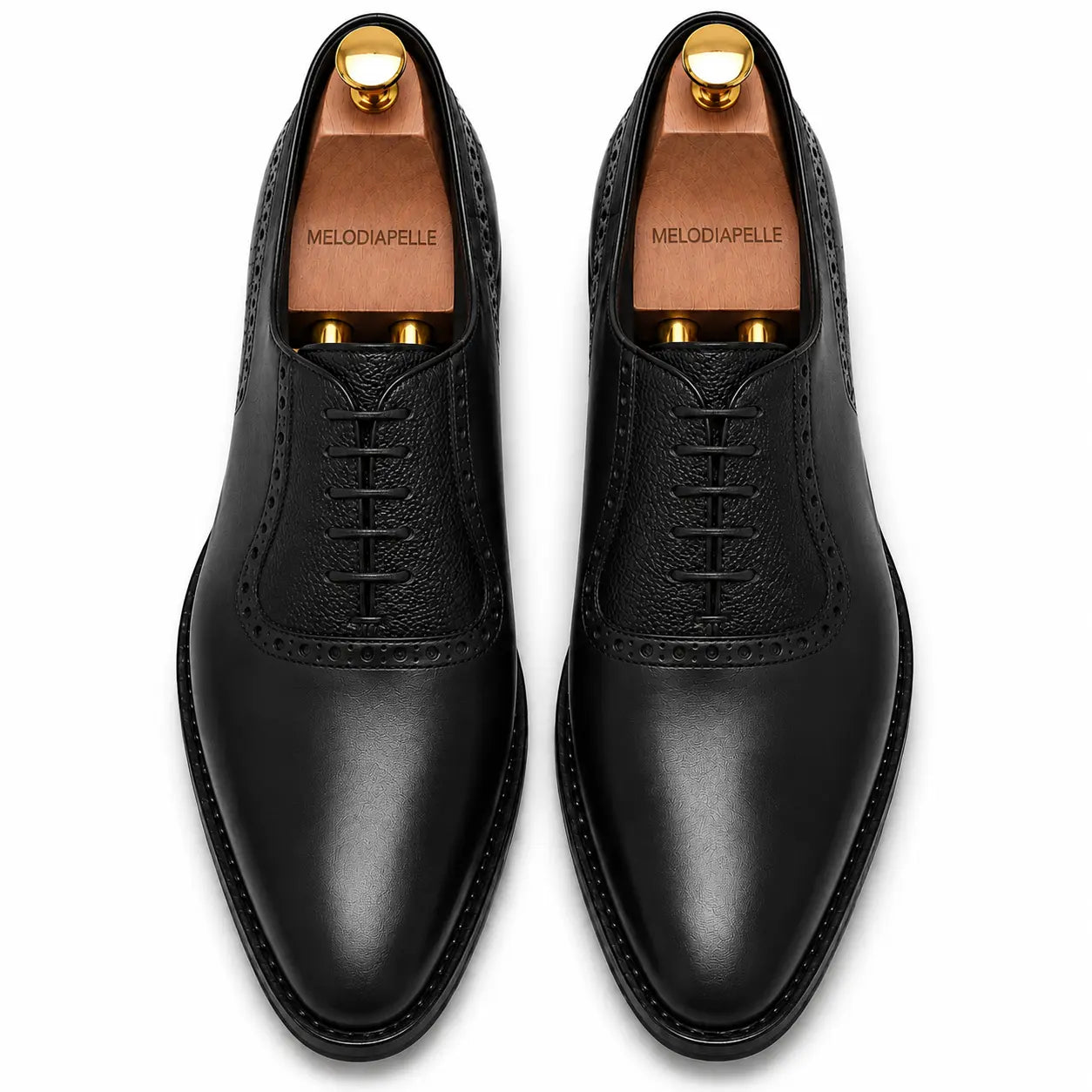 Melodiapelle Montserrat Two-Tone Saddle Oxford in black leather, pair top-down view, handcrafted in Agra