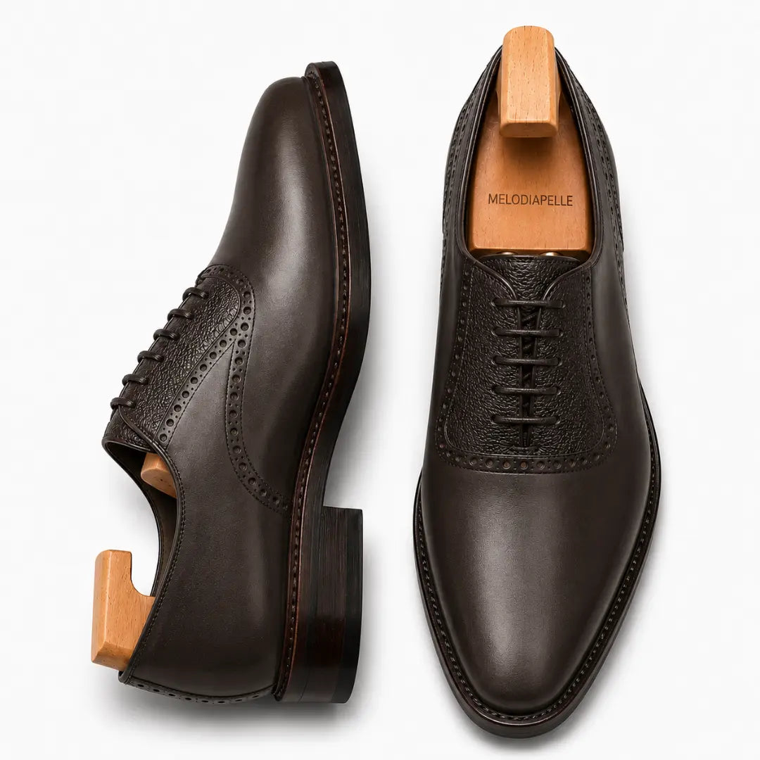 Brown leather saddle Oxford, three-quarter angle showing heel and two-tone detailing