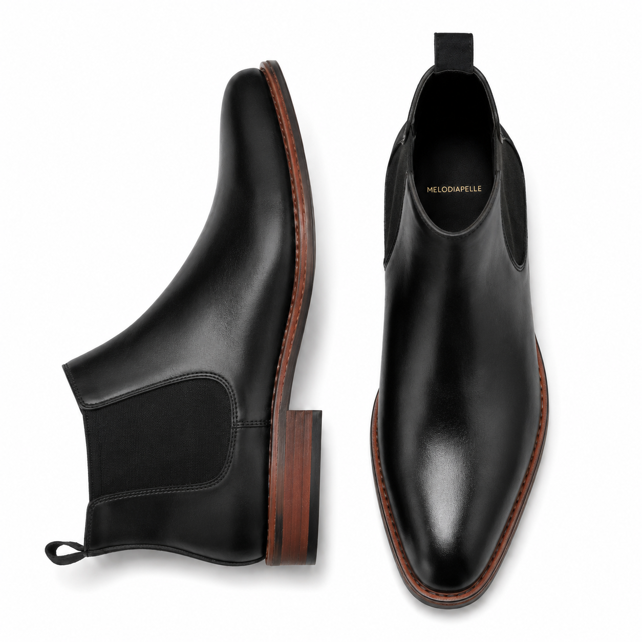 Black suede Chelsea boot, three-quarter angle showing heel and elastic side panel