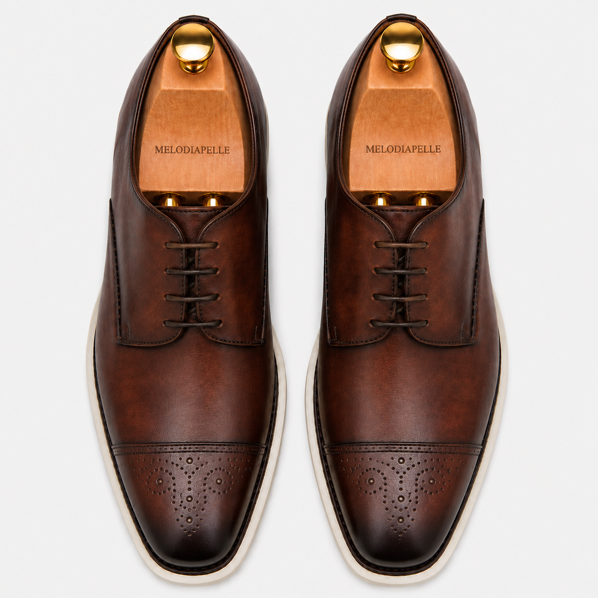 Melodiapelle Moorland Cap-Toe Derby in dark chocolate leather, pair top-down view, handcrafted in Agra