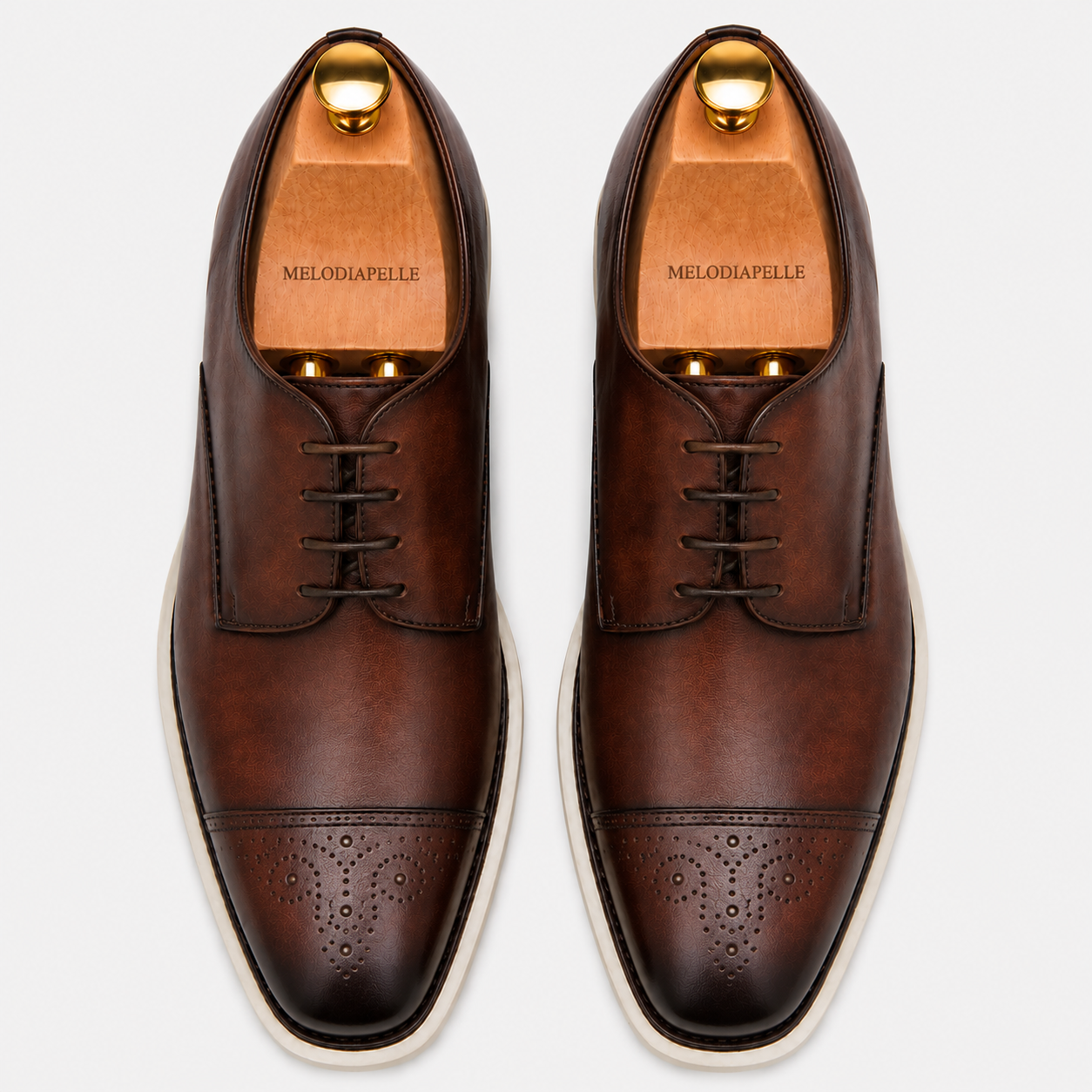 Melodiapelle Moorland Cap-Toe Derby in dark chocolate leather, pair top-down view, handcrafted in Agra
