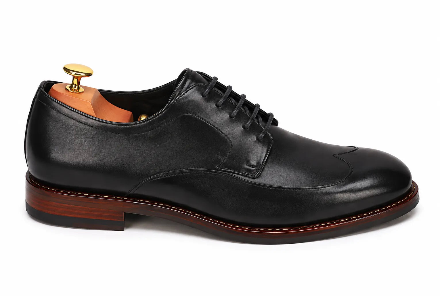 Side profile of the Morano Wingtip Brogue Derby in black leather on white background