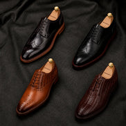 Melodiapelle Morano Wingtip Brogue Derby collection in oxblood, tan and black leather, handcrafted wingtip brogue Derby shoes displayed together
