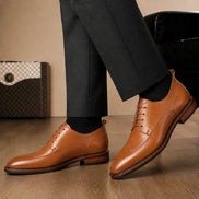 Melodiapelle Morano Wingtip Brogue Derby in tan leather worn with formal trousers, on-feet shot