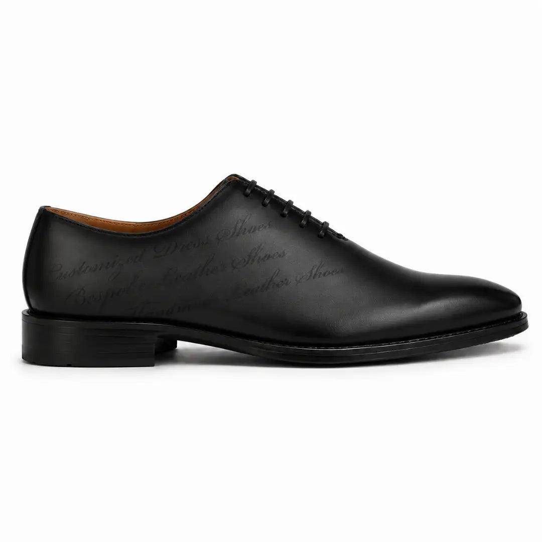 Side profile of the Mordecai Script Wholecut Oxford in black leather on white background