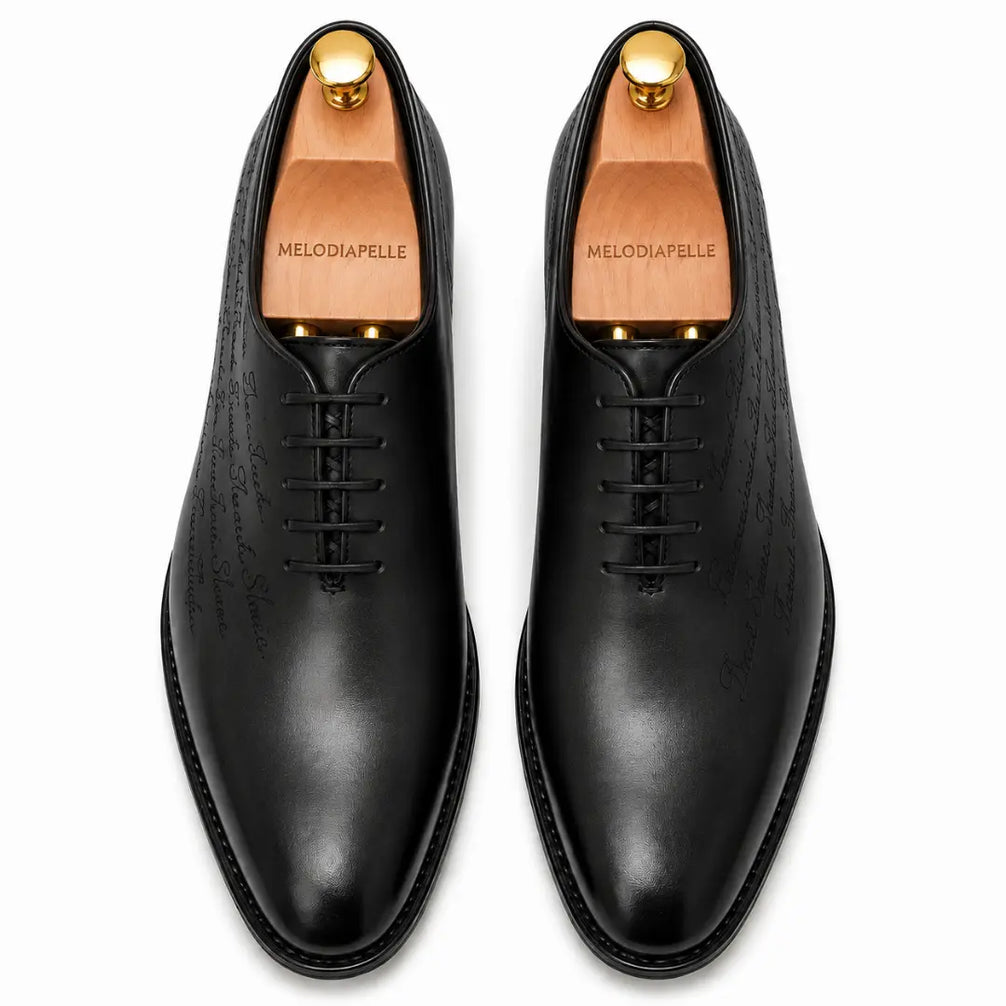 Melodiapelle Mordecai Script Wholecut Oxford in black leather, pair top-down view, handcrafted in Agra