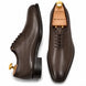 Brown leather wholecut Oxford, three-quarter angle showing seamless upper and heel