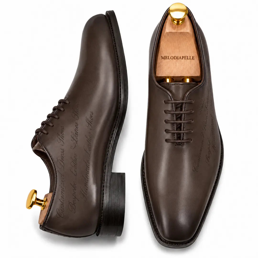 Brown leather wholecut Oxford, three-quarter angle showing seamless upper and heel