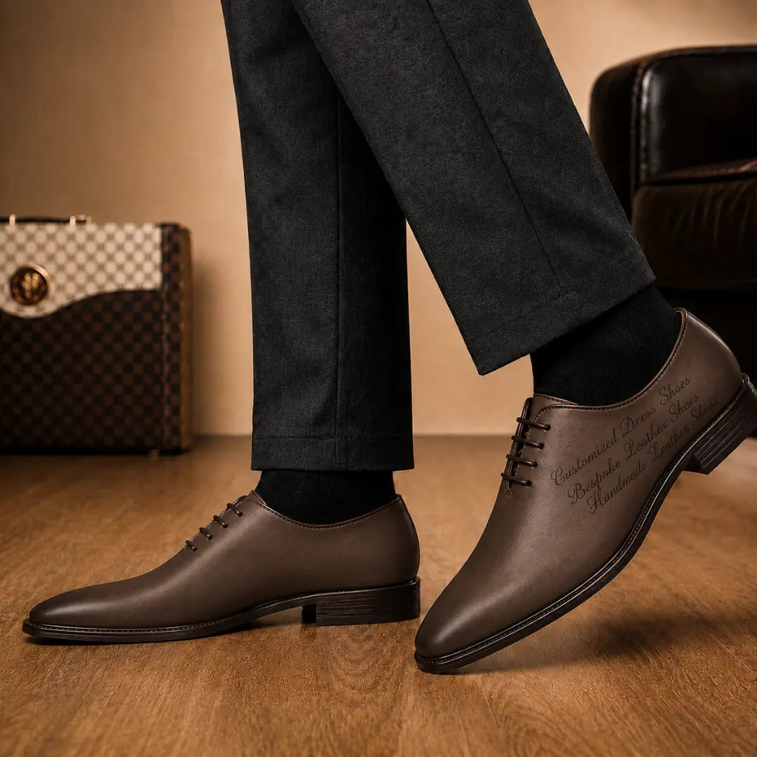 Melodiapelle Mordecai Script Wholecut Oxford in brown leather worn with formal trousers, on-feet shot