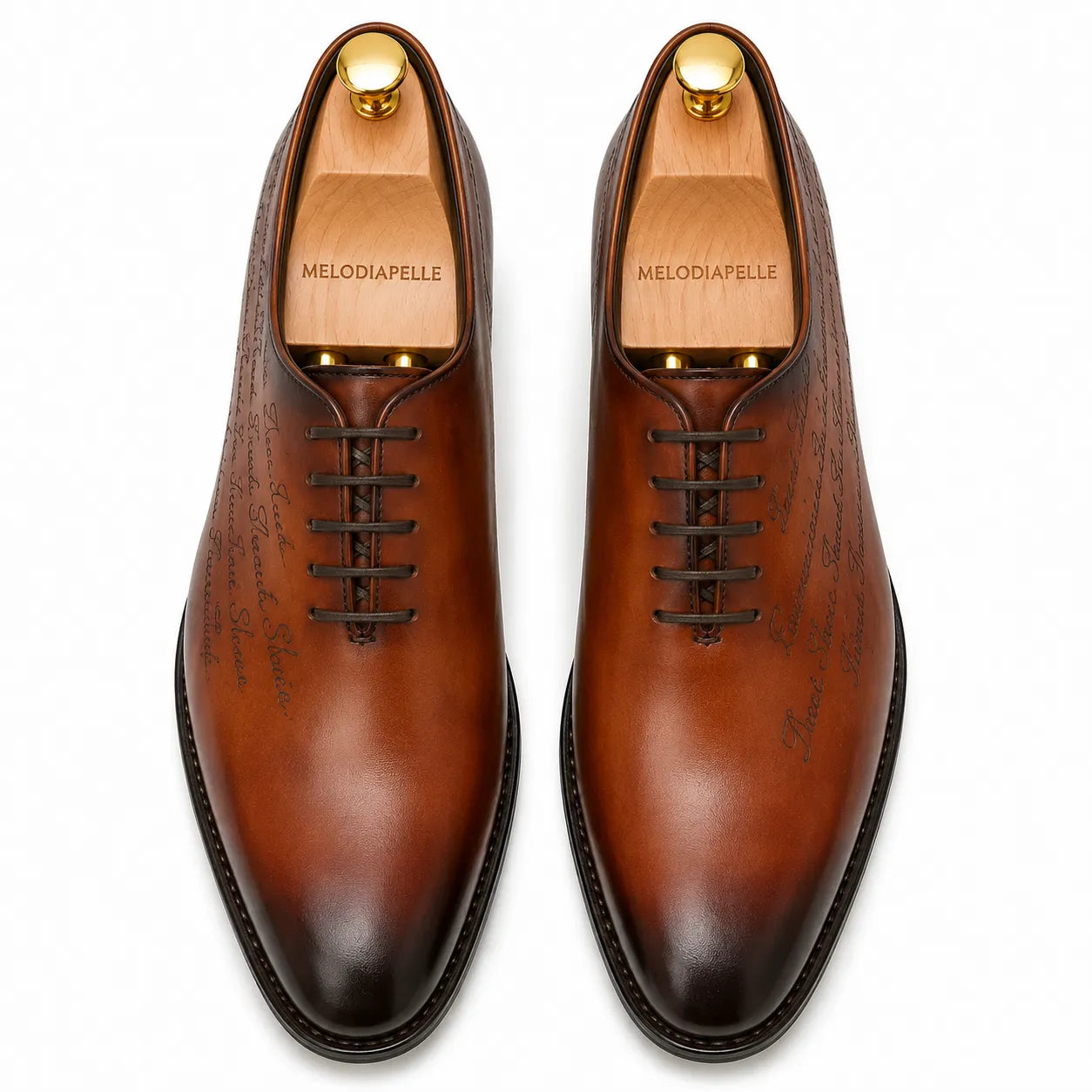 Melodiapelle Mordecai Script Wholecut Oxford in cognac tan leather, pair top-down view, handcrafted in Agra