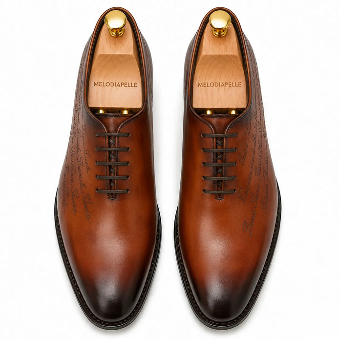 Melodiapelle Mordecai Script Wholecut Oxford in cognac tan leather, pair top-down view, handcrafted in Agra