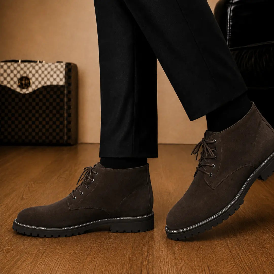 Melodiapelle Moreno Combat Boot in dark brown suede worn with trousers, on-feet shot