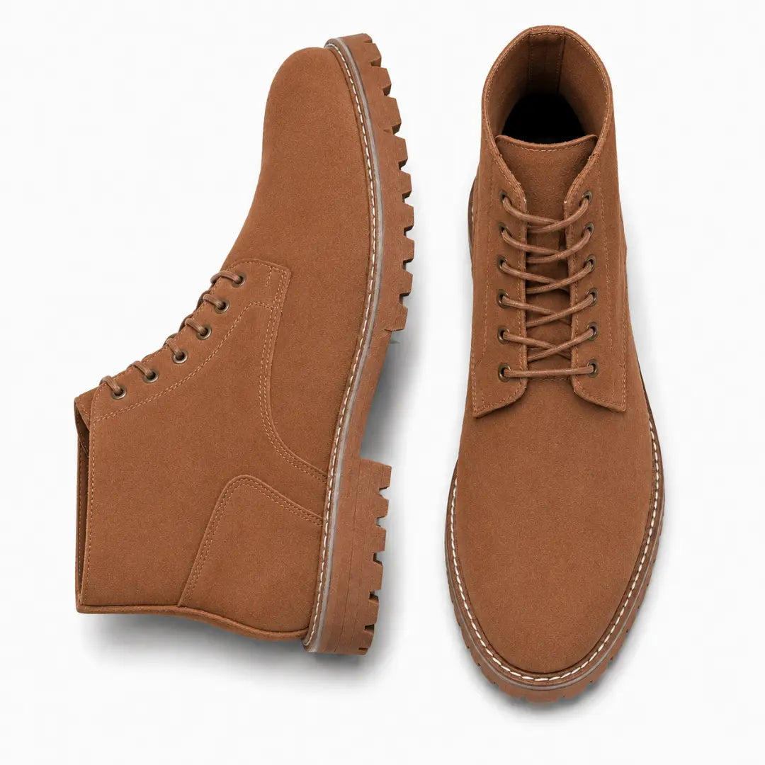 Rust tan leather combat boot, three-quarter angle showing heel and sole detailing
