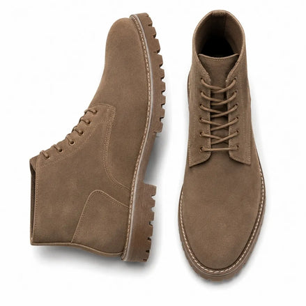 Sand beige suede combat boot, three-quarter angle showing heel and sole detailing