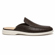 Side profile of the Moreno Mule in dark brown croc-embossed leather on white background