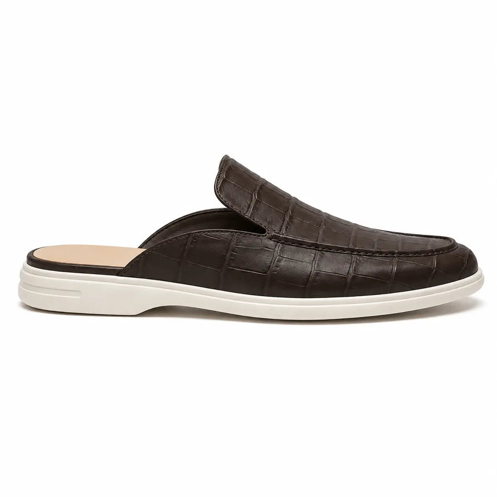 Side profile of the Moreno Mule in dark brown croc-embossed leather on white background