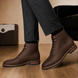 Melodiapelle Morocco Cap Toe Combat Boot in dark espresso nubuck leather worn with trousers, on-feet shot