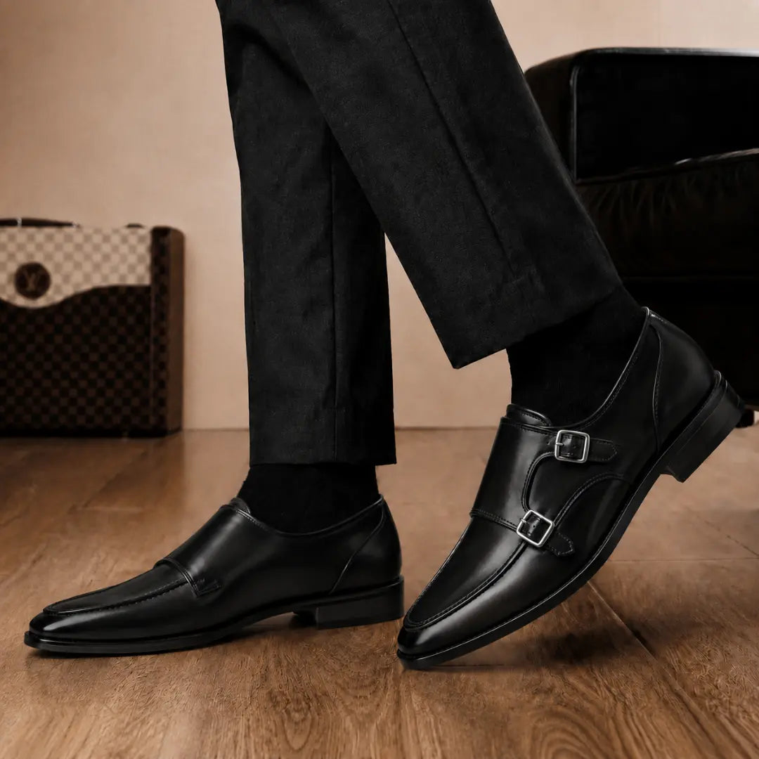Melodiapelle Mortimer Apron Monk Strap in black leather worn with formal trousers, on-feet shot