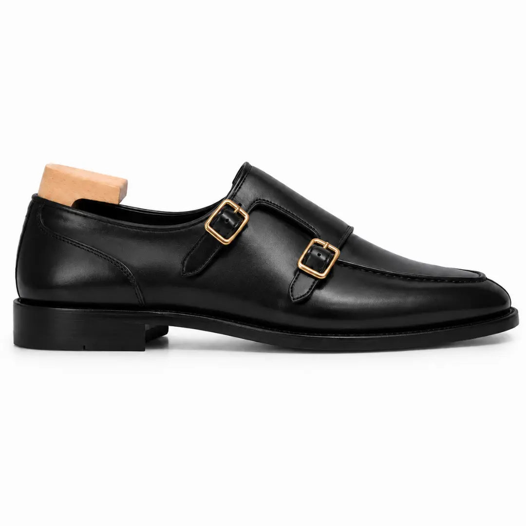 Side profile of the Mortimer Apron Monk Strap in black leather on white background