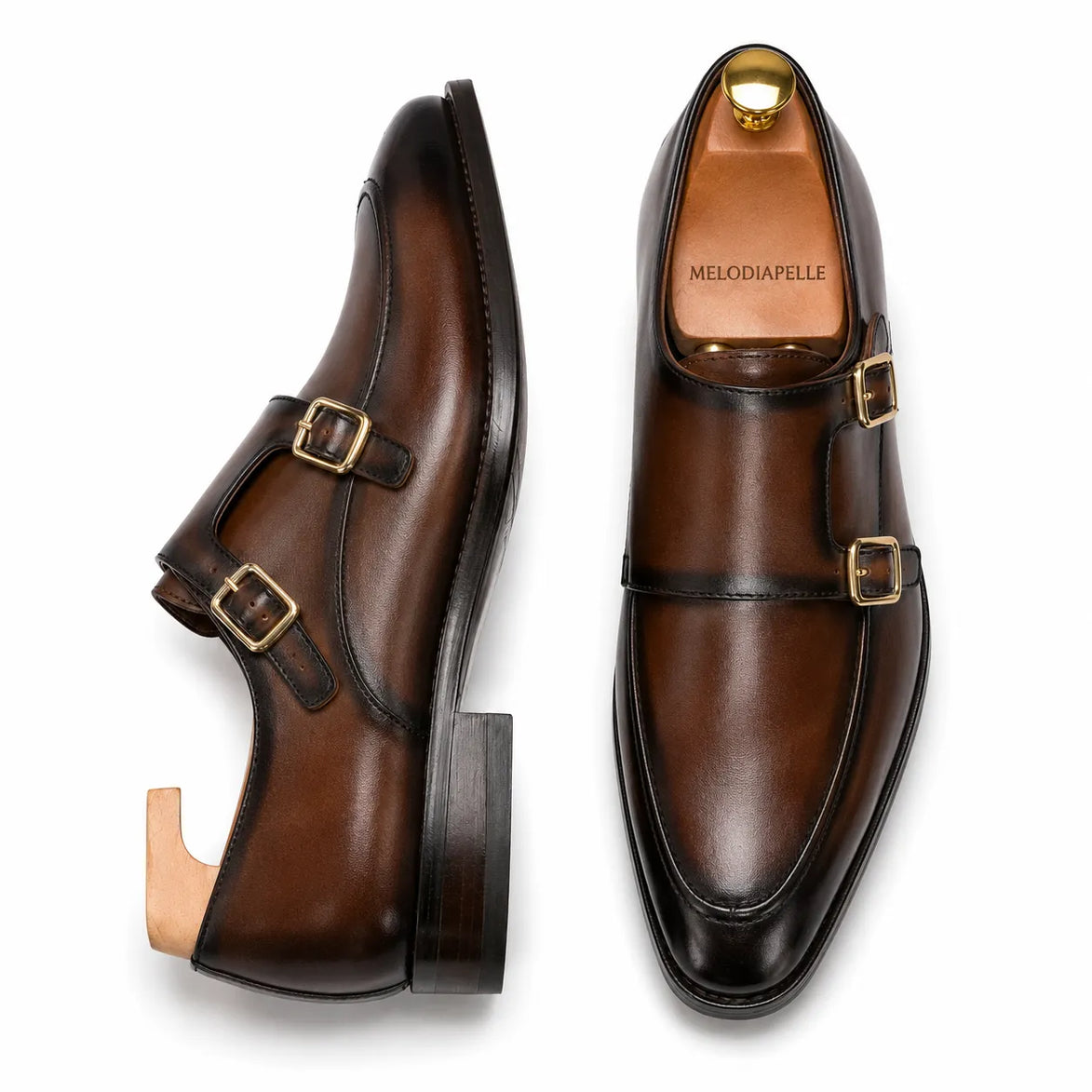 Cognac brown leather double monk strap shoe, three-quarter angle showing buckles and heel