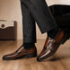 Melodiapelle Mortimer Apron Monk Strap in cognac brown leather worn with formal trousers, on-feet shot