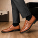 Melodiapelle Mortimer Apron Monk Strap in tan leather worn with formal trousers, on-feet shot