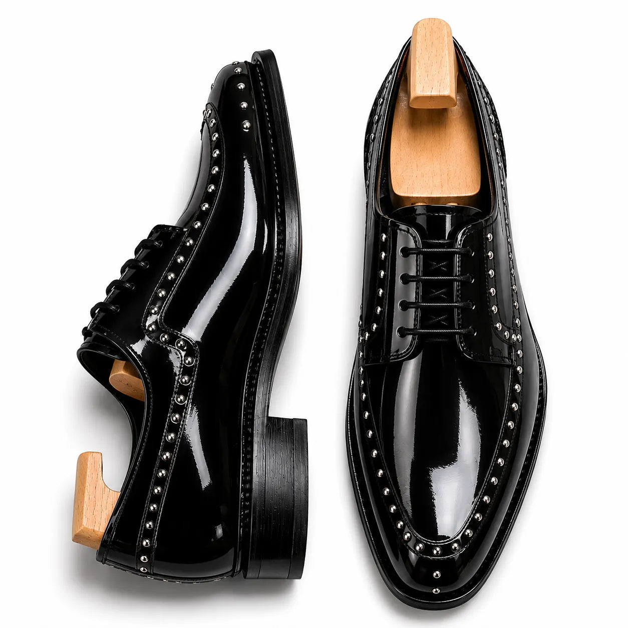 Nero black leather studded apron Derby, three-quarter angle showing heel and stud detailing