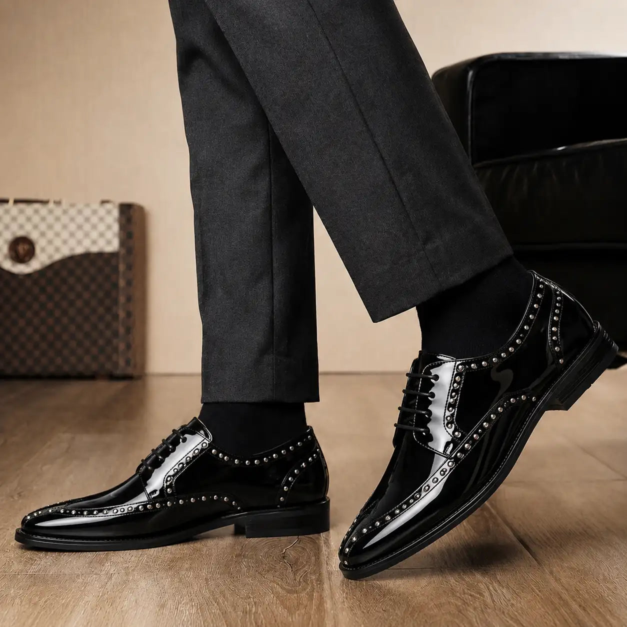 Melodiapelle Mortlach Studded Apron Derby in nero black leather worn with formal trousers, on-feet shot