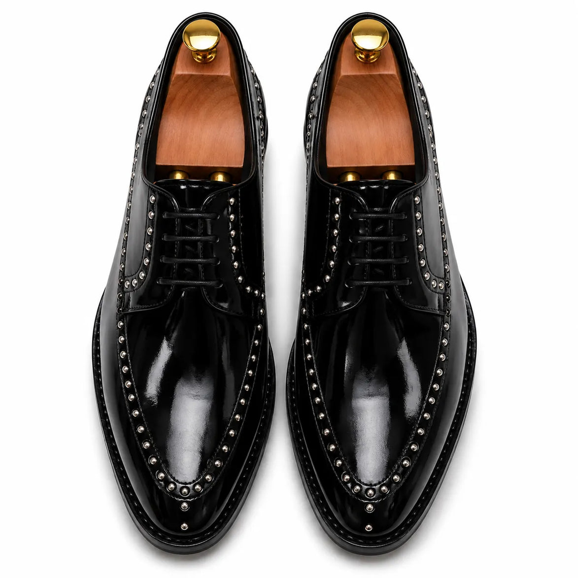 Melodiapelle Mortlach Studded Apron Derby in nero black leather, pair top-down view, handcrafted in Agra