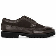 Side profile of the Mosaic Two-Tone Wingtip Derby in brown leather on white background
