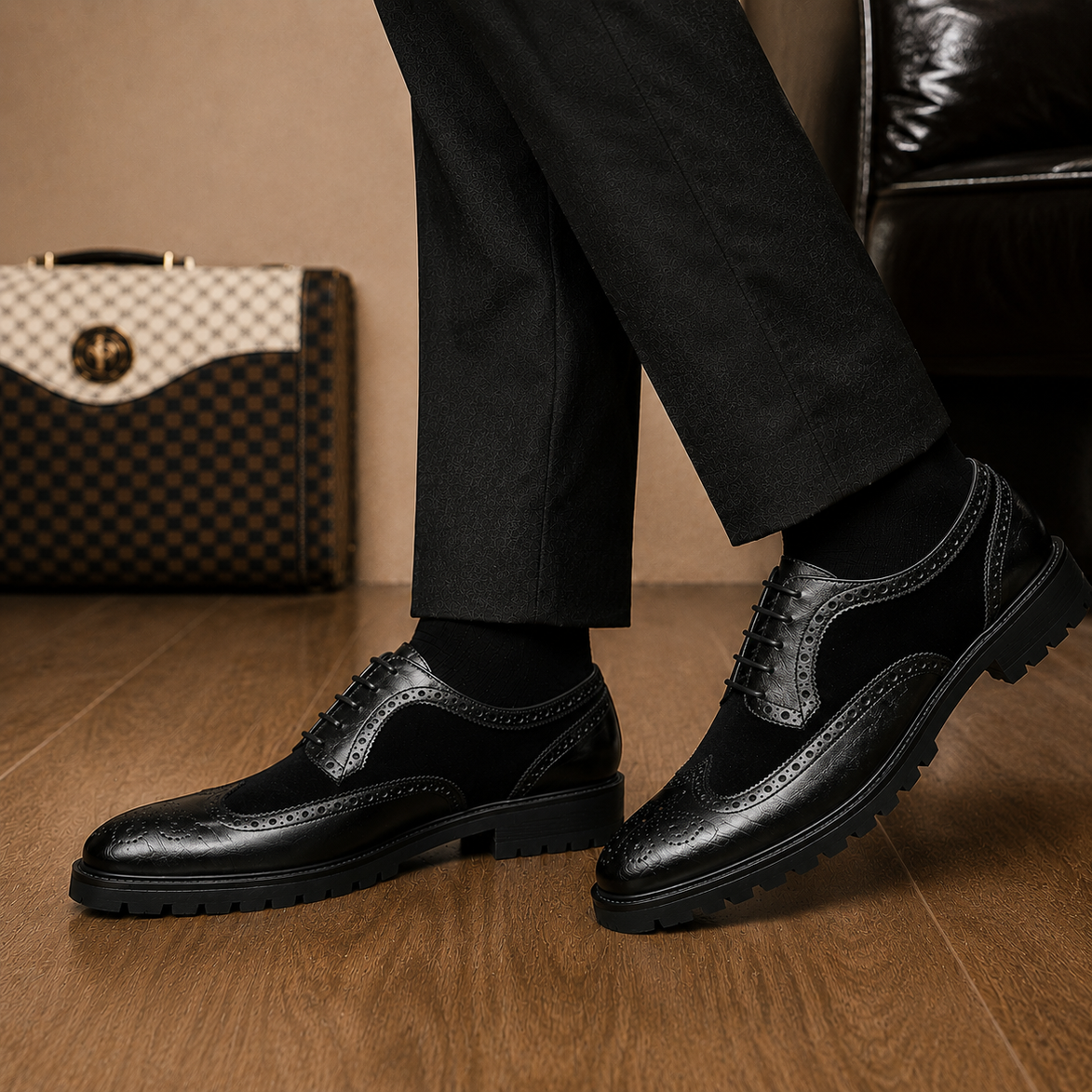 Melodiapelle Mosaic Two-Tone Wingtip Derby in nero black leather worn with formal trousers, on-feet shot