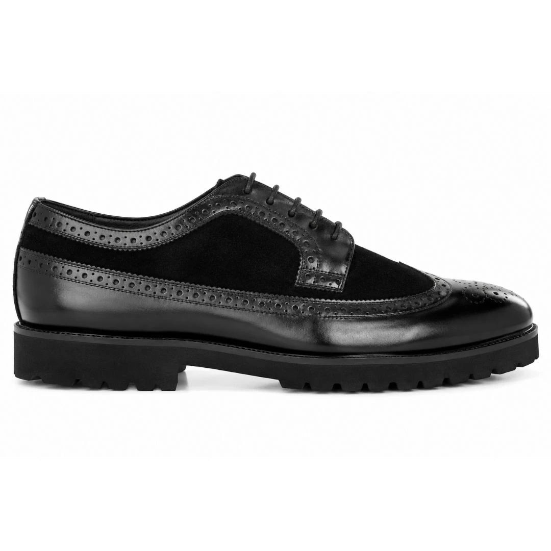 Side profile of the Mosaic Two-Tone Wingtip Derby in nero black leather on white background