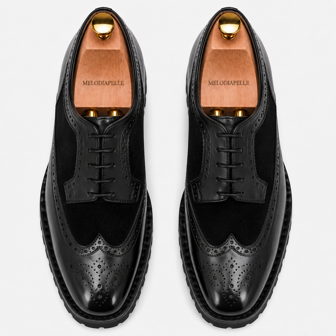 Melodiapelle Mosaic Two-Tone Wingtip Derby in nero black leather, pair top-down view, handcrafted in Agra