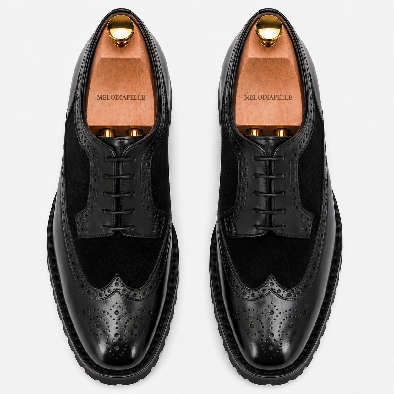 Melodiapelle Mosaic Two-Tone Wingtip Derby in nero black leather, pair top-down view, handcrafted in Agra