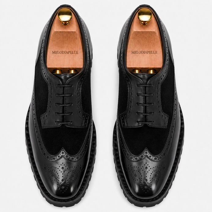 Melodiapelle Mosaic Two-Tone Wingtip Derby in nero black leather, pair top-down view, handcrafted in Agra