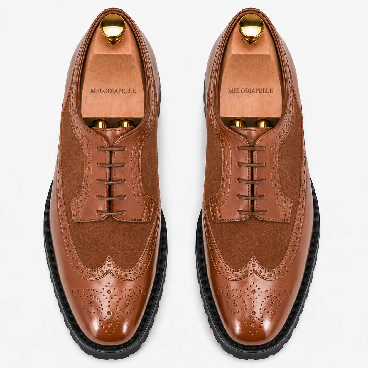 Melodiapelle Mosaic Two-Tone Wingtip Derby in tan leather, pair top-down view, handcrafted in Agra