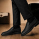 Melodiapelle Moscow Opera Slip-On in black leather worn with trousers, on-feet shot