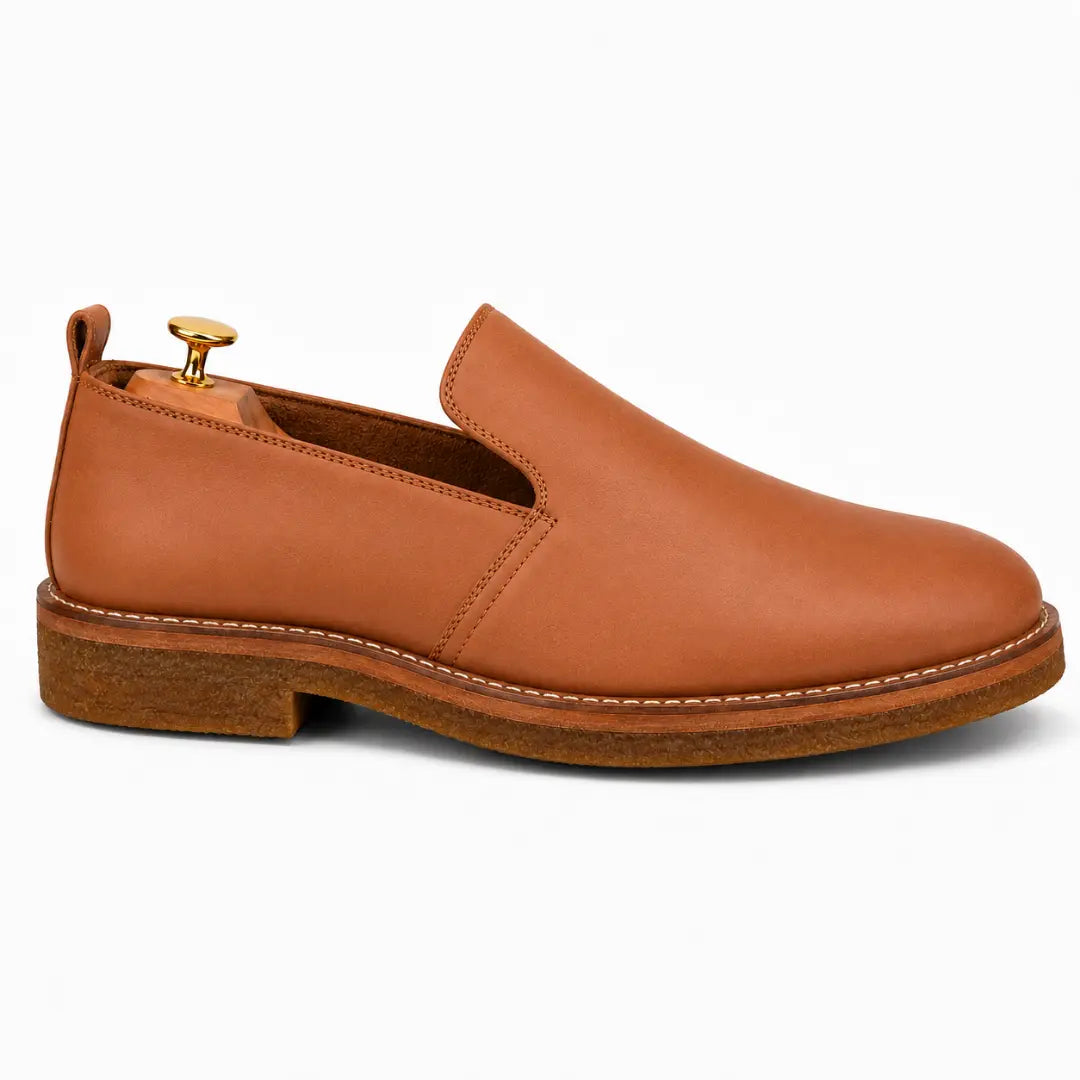 Side profile of the Moscow Opera Slip-On in tan leather on white background